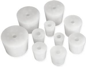 Silicone plugs for filling of PET bottles